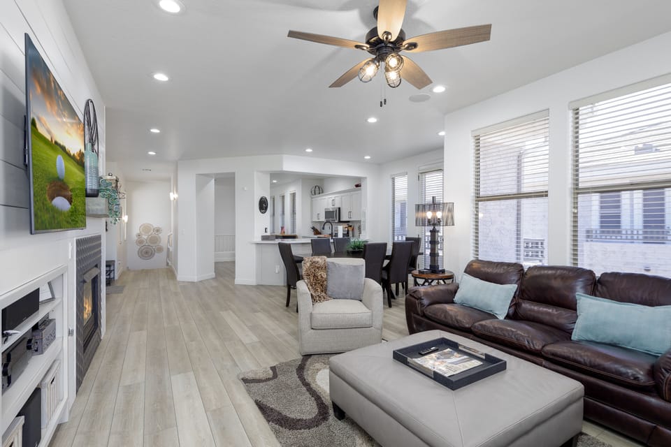Large living area with a high-definition television. 