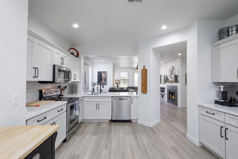 Fully renovated kitchen with stunning quartz counters.