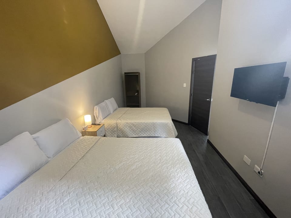 Economy Double Room, 2 Queen Beds | Blackout drapes, soundproofing, iron/ironing board, free WiFi