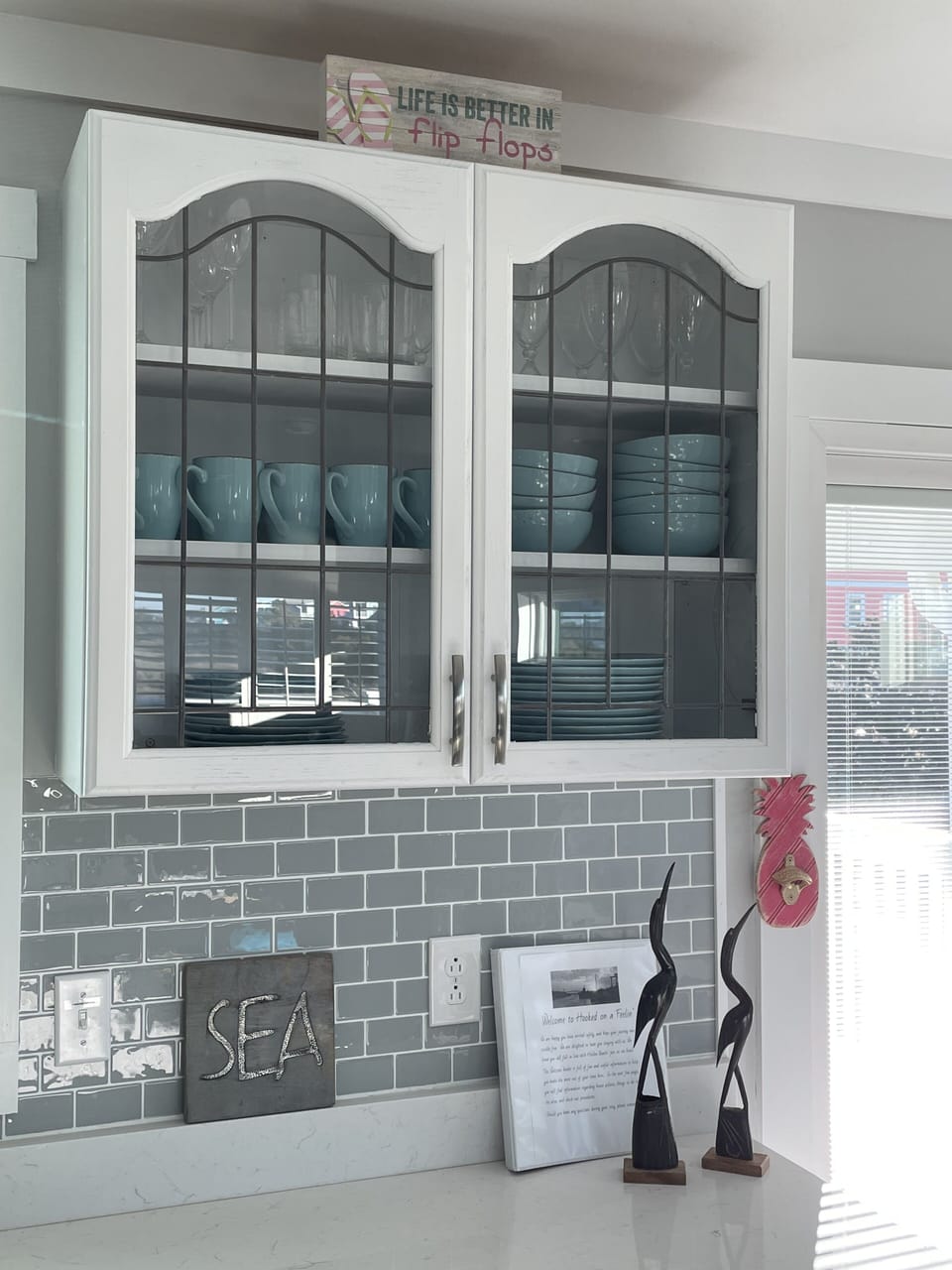 Beach themed dishware and house manual