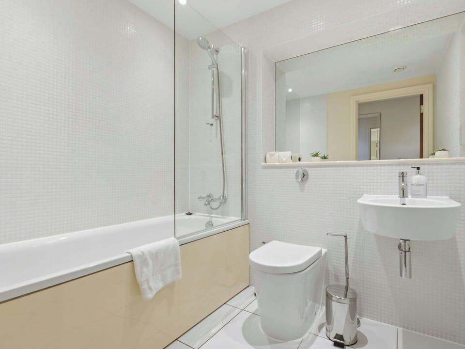 Bathroom, Interior Design, Plumbing Fixture, Flooring, Floor, Bathtub, Plumbing, Tap, Toilet, Sink