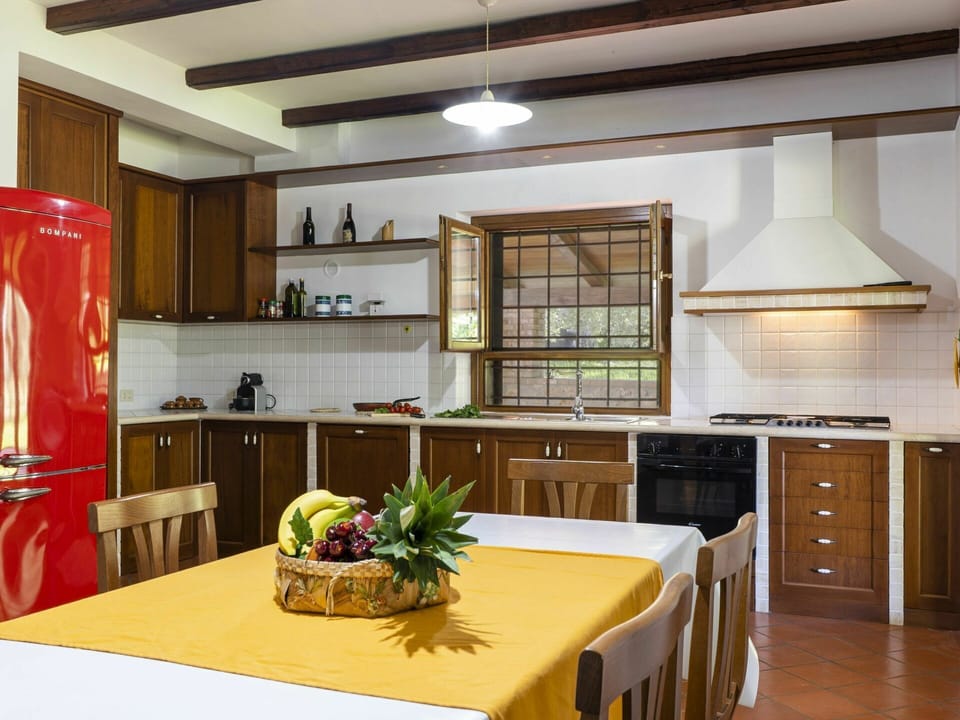 Cabinetry, Countertop, Furniture, Property, Table, Kitchen Appliance, Kitchen Stove, Kitchen, Lighting, Home Appliance