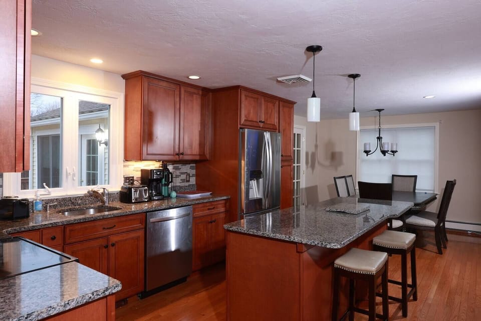A whole view Kitchen and dining 