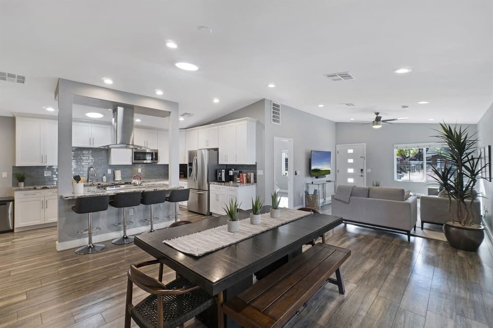 Spacious open-plan layout featuring the kitchen, dining, and living areas, creating a harmonious and inviting living space.