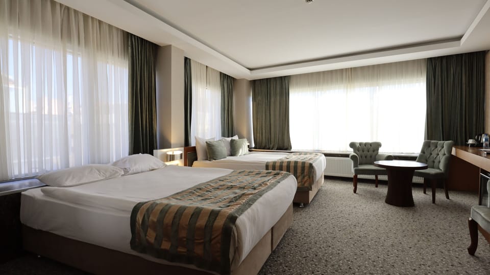 Family Room | In-room safe, individually decorated, individually furnished, free WiFi