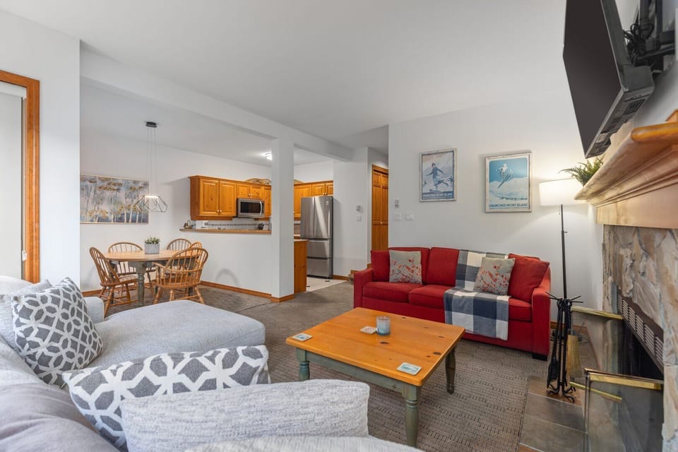 Open plan living, kitchen, and dining areas