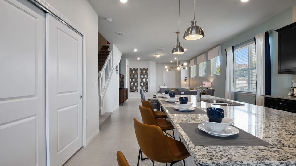 Beautiful view of bar seating and front room