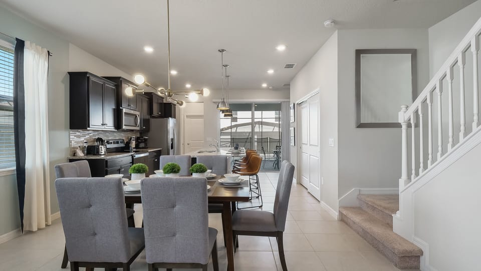Beautiful walkway to upstairs area next to dining room and kitchen