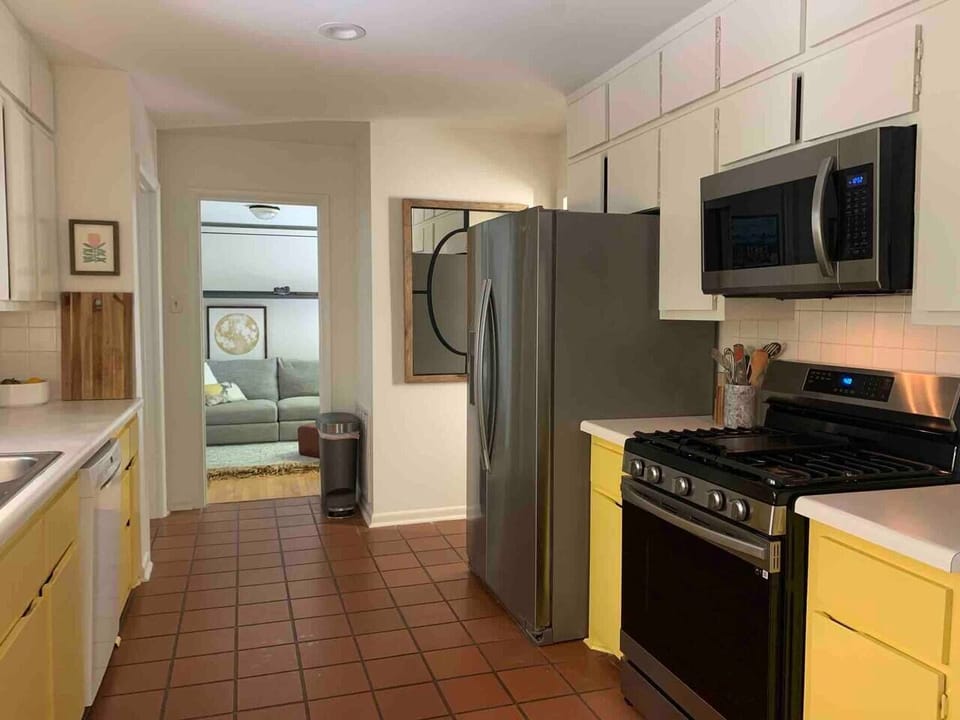 Discover a Fully Stocked Oasis with Stainless Steel Appliances, Premium Cookware, and Every Essential Tool Imaginable.