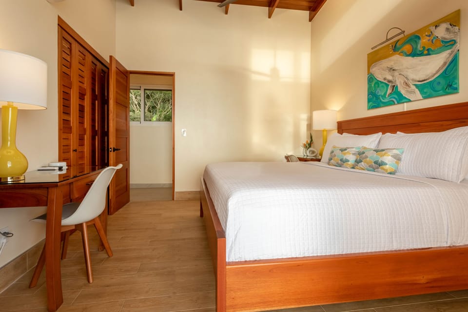 Whale bedroom #3 - comfy king bed, 2 workspace desks, ac, ocean/pool view