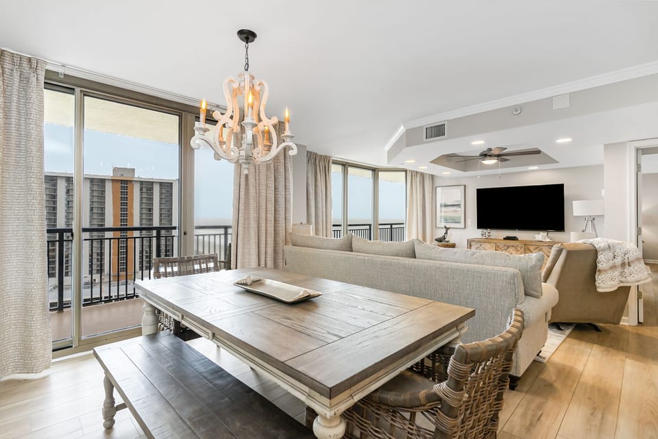 Dining Area - Open dining area with access to the balcony.