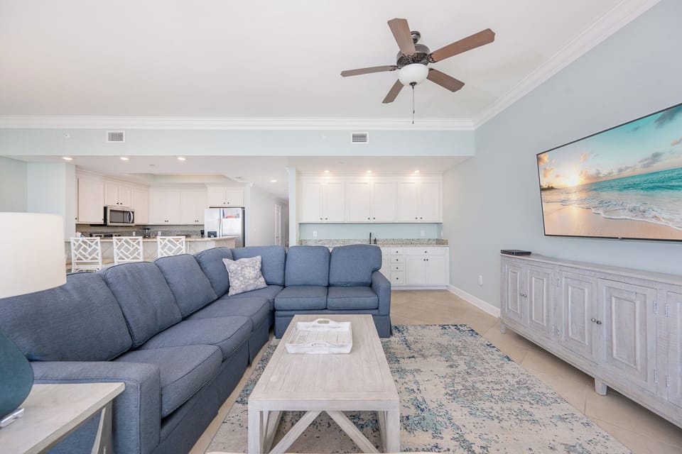 Unwind on the plush couch as you enjoy streaming your favorite shows, surrounded by coastal-inspired decor