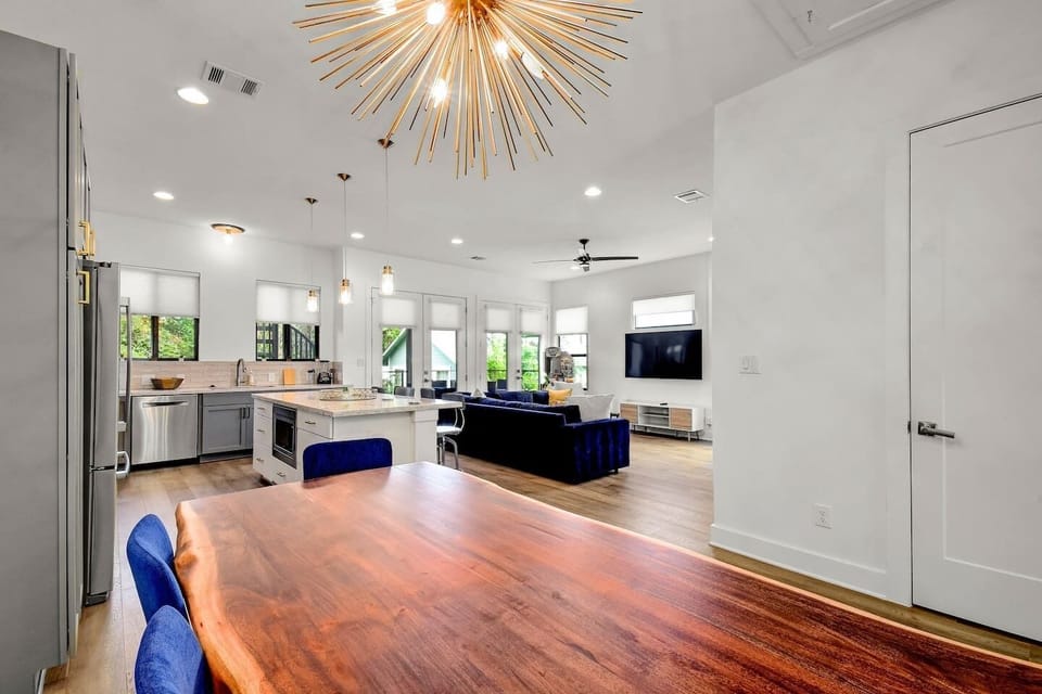 Cook, dine, and relax in this integrated kitchen-living setup.
