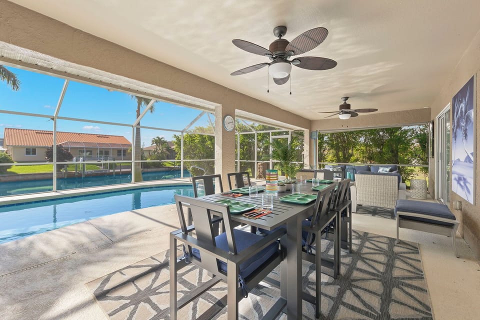 Enjoy your meals poolside with the dining area that sits 6