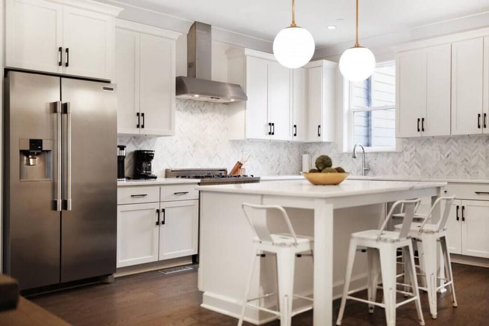Upgraded appliances and the beautiful kitchen island.