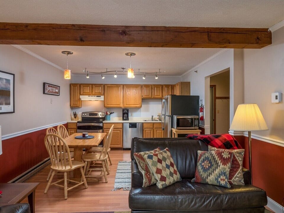 Living, dining, and kitchen area