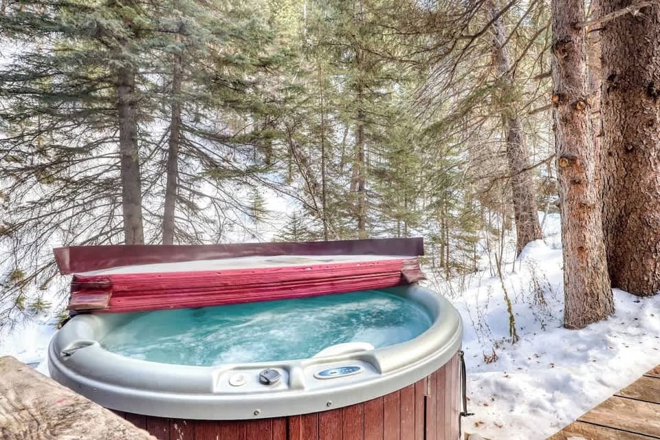 Hot Tub- located on the back deck right above the running creek