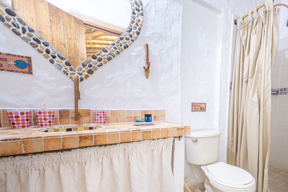 Superior Quadruple Room | Bathroom | Shower, free toiletries, towels, soap