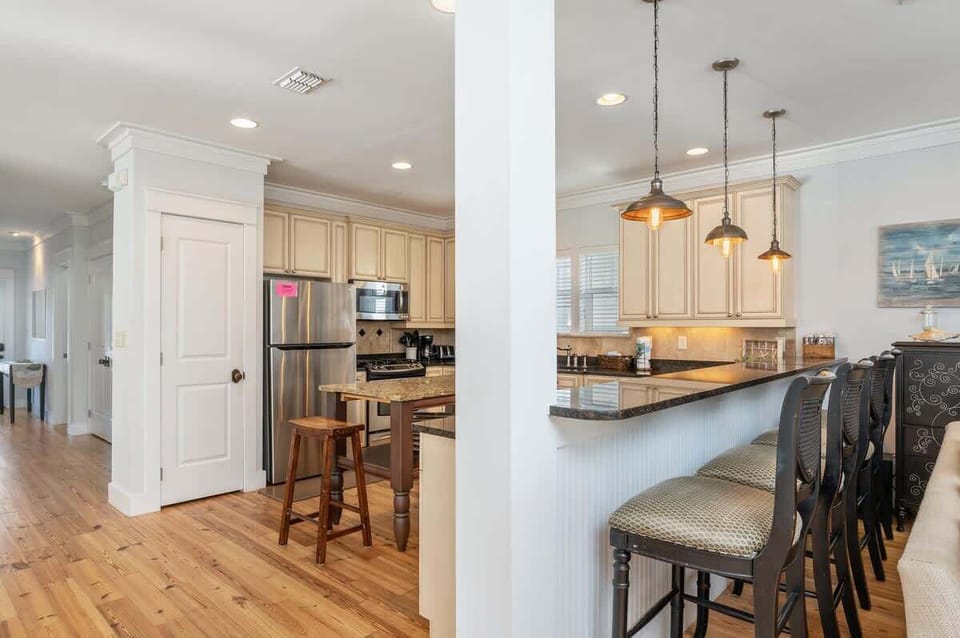 Our kitchen, right past the laundry closet, is sure to make the family chef smile.