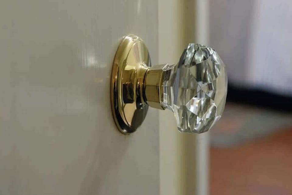 The original glass knobs from the 50's were preserved in the remodel.