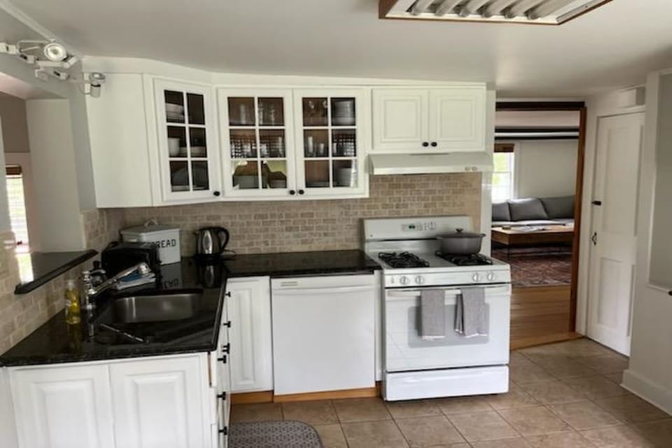 serving window and entrance on the left to the dining room