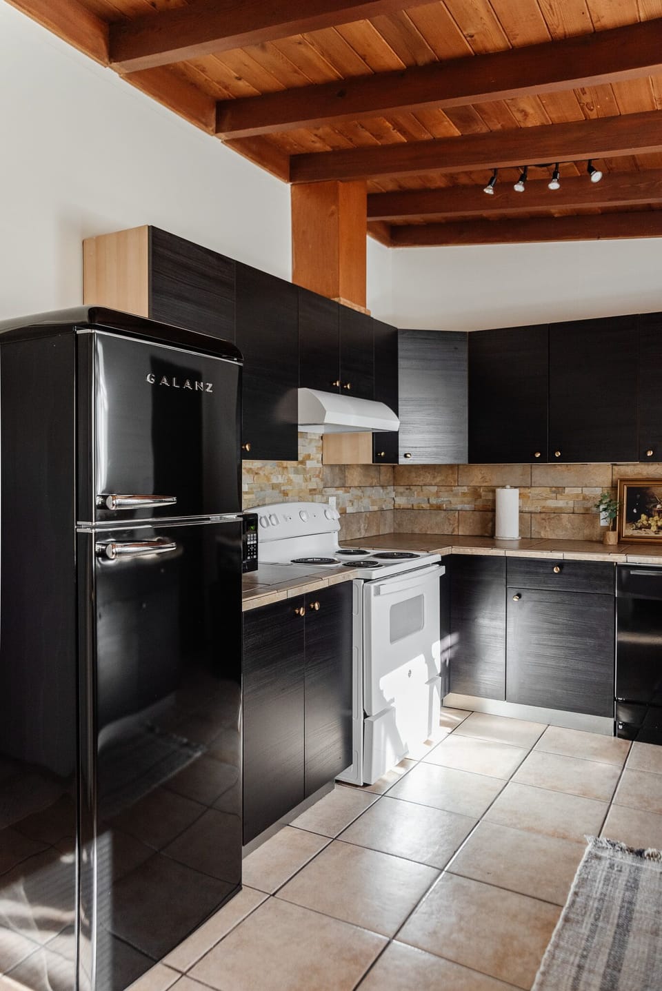 Our kitchen features all new appliances and a dishwasher for you convenience.