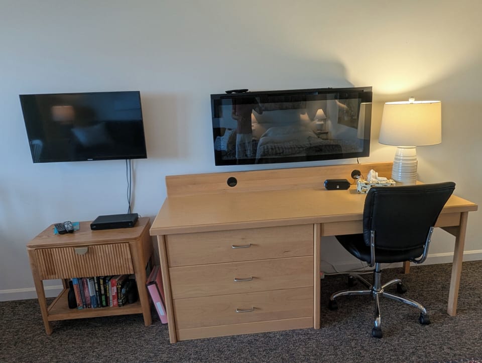 desk area with fireplace 