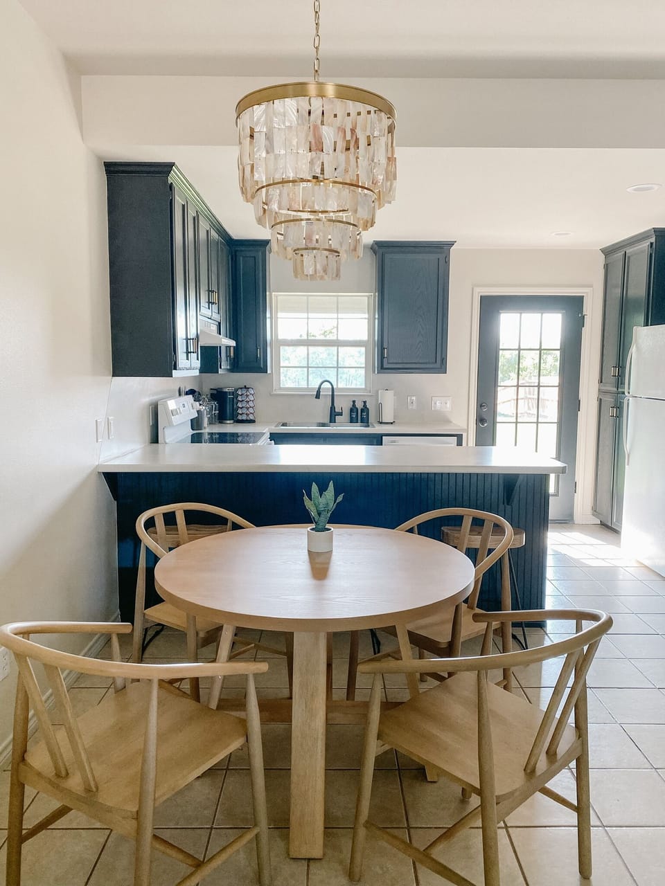 Enjoy a meal at our cozy in-kitchen dining table, or at the bar.