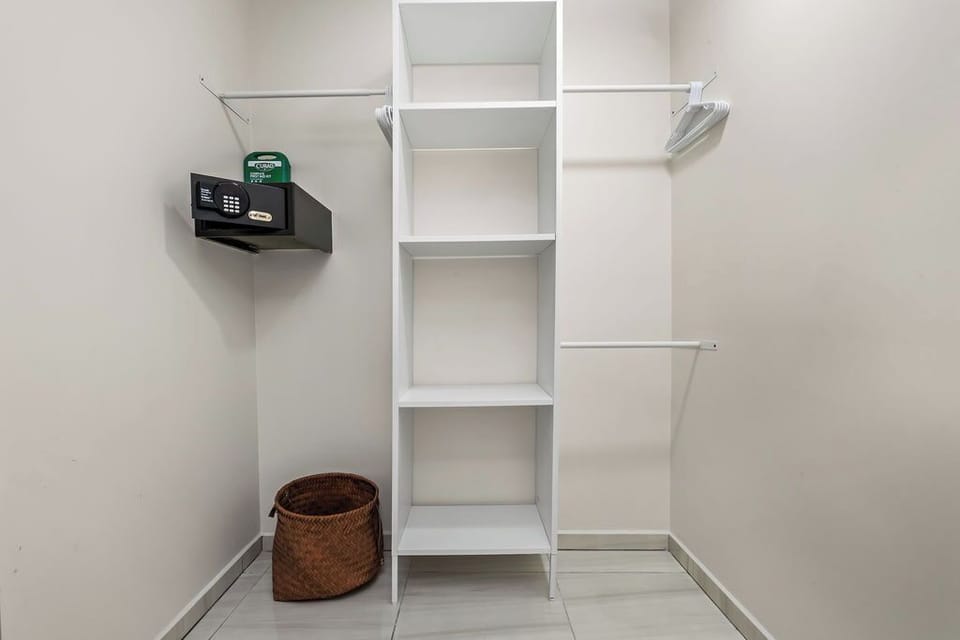 This room is thoughtfully styled and includes a Queen bed, individual walk-in closet, and plenty of space to unwind. Ideal for couples, friends, or teens needing their own space.