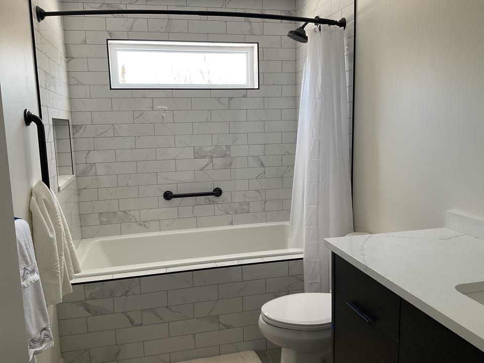 Bathroom with deep soaking tub.