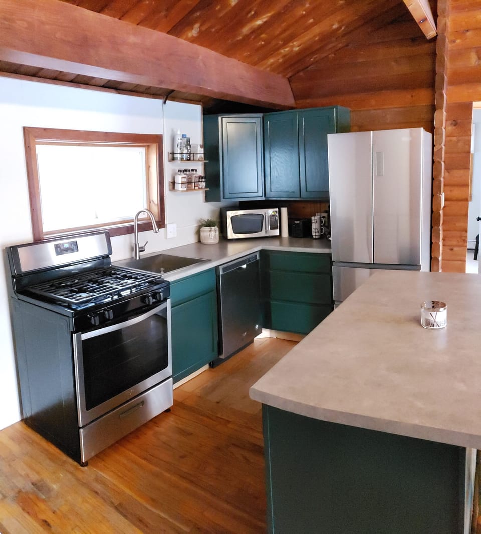 Fully stocked kitchen with dishes, silverware, cutlery set, pots/pans, etc.