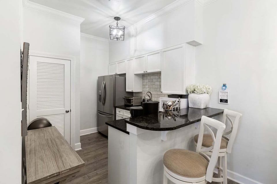 Kitchen area with bar seating
