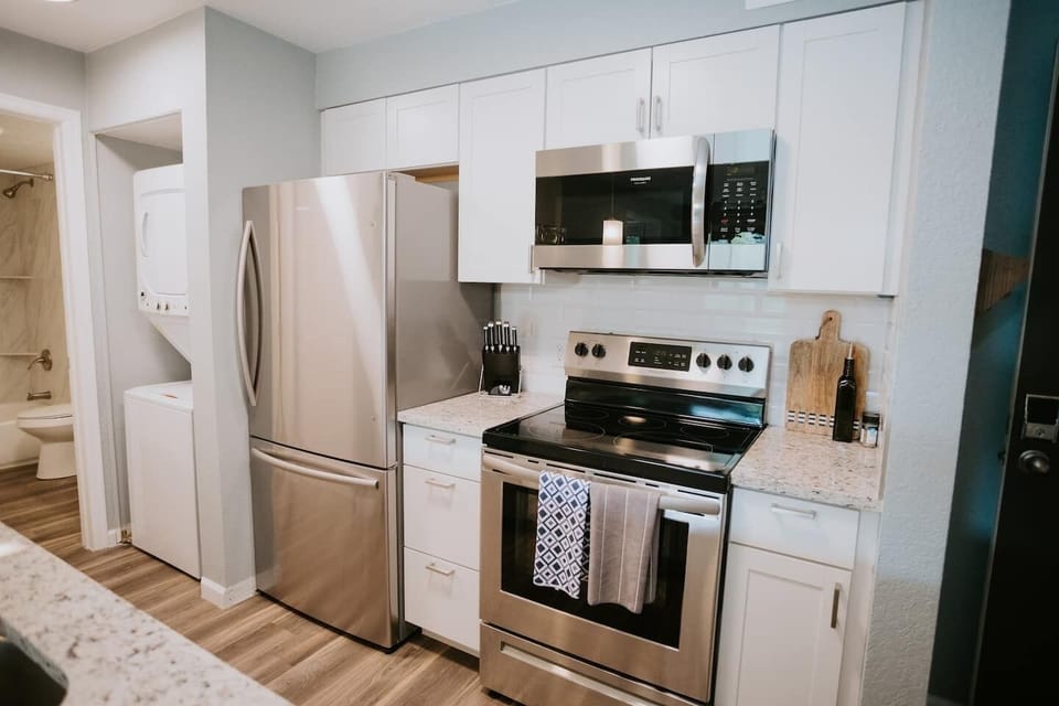 Fully equipped kitchen with all of the utensils and appliances you'll need.