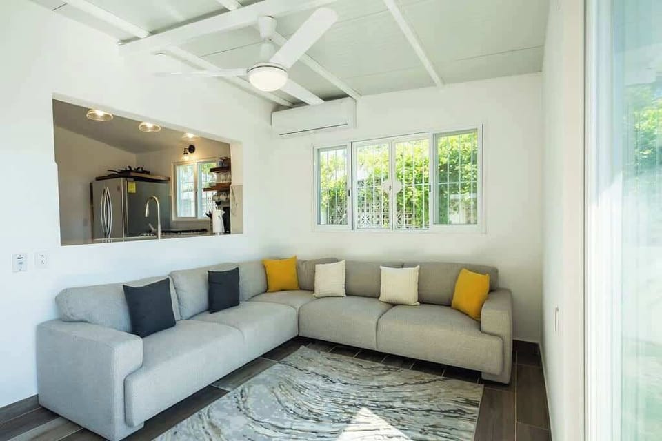 Relax on the 18-ft sectional with Roku TV, Netflix, and ocean breezes.