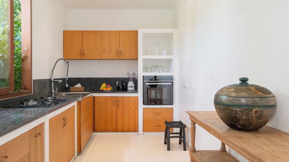 Family Villa | Private kitchen | Stovetop, toaster, dining tables