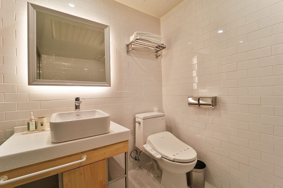 Suite | Bathroom | Hair dryer, bathrobes, bidet, towels