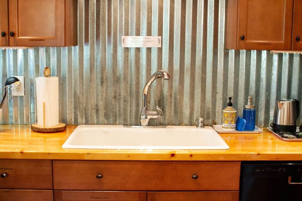 Wash them yourself or use the dishwasher.