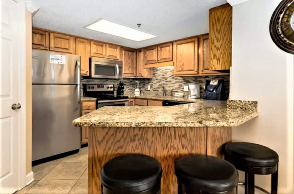 Updated kitchen, granite counter tops, stainless steel appliances.