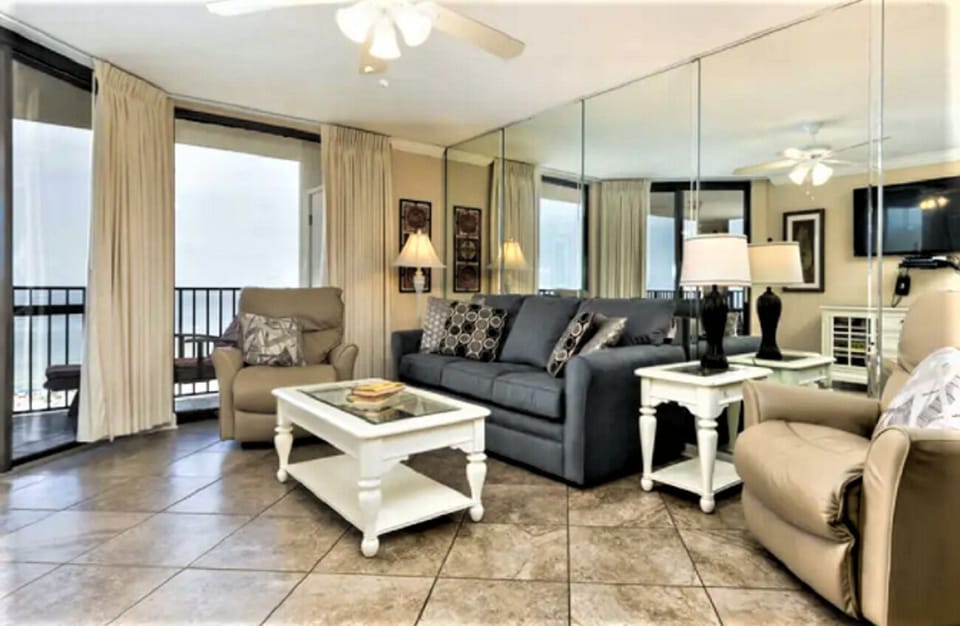 Living area view.  Tiled throughout the condo.