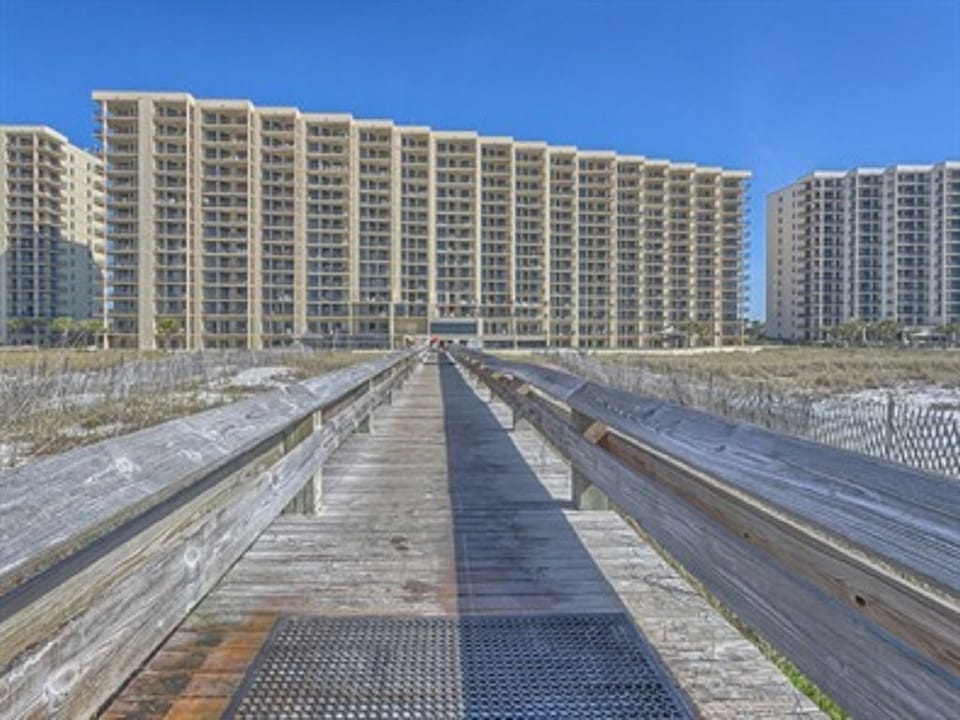 View of back of the building walking from the beach up the boardwalk.