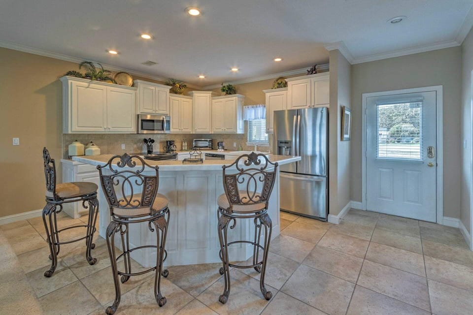 The kitchen is fully stocked with cooking basics.