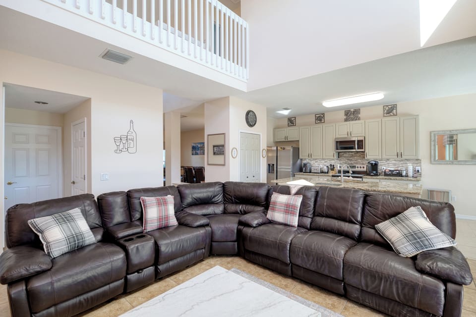 Family House, 5 Bedrooms | Living area | 55-inch Smart TV with digital channels, foosball, streaming services