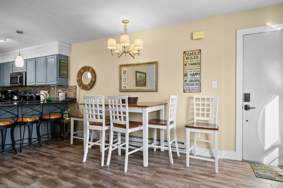 Bright dining area with mountain-inspired décor — perfect for home-cooked meals.