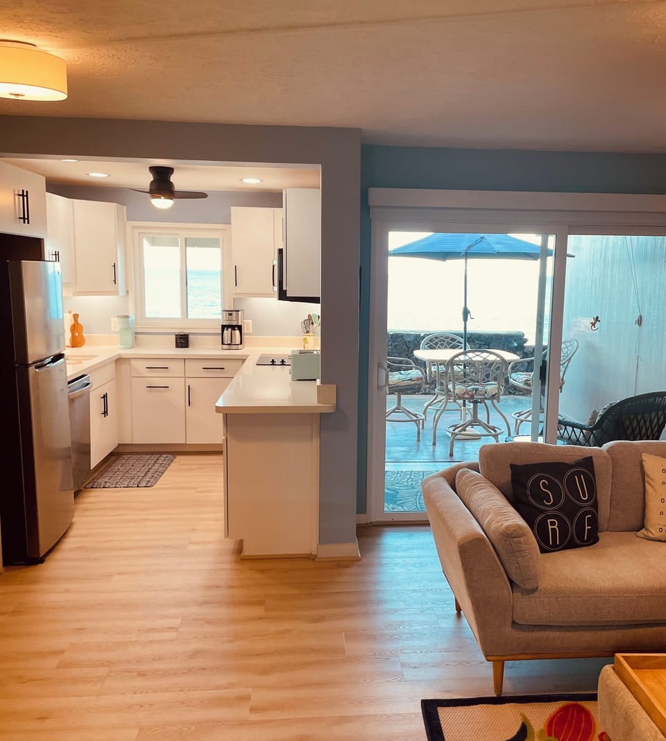 Galley kitchen walls were removed for an open feel