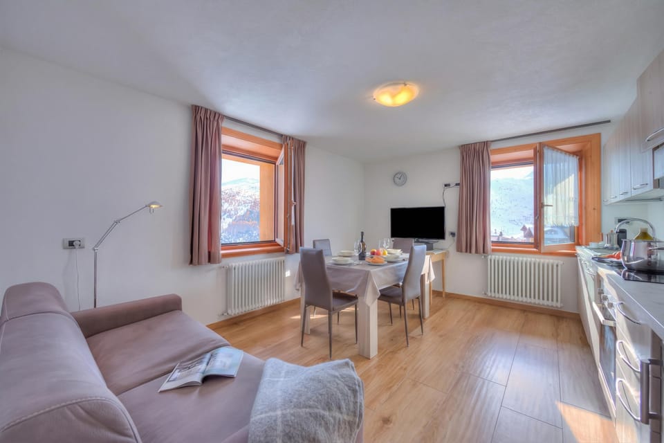 Family Apartment, 1 Bedroom, Microwave (Fiocco Di Neve Ski in- Ski out 10m) | Living room | Flat-screen TV