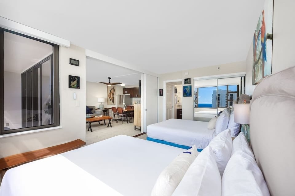 Relax in your comfortable bedroom with 2 queen beds and quick access to the bathroom.