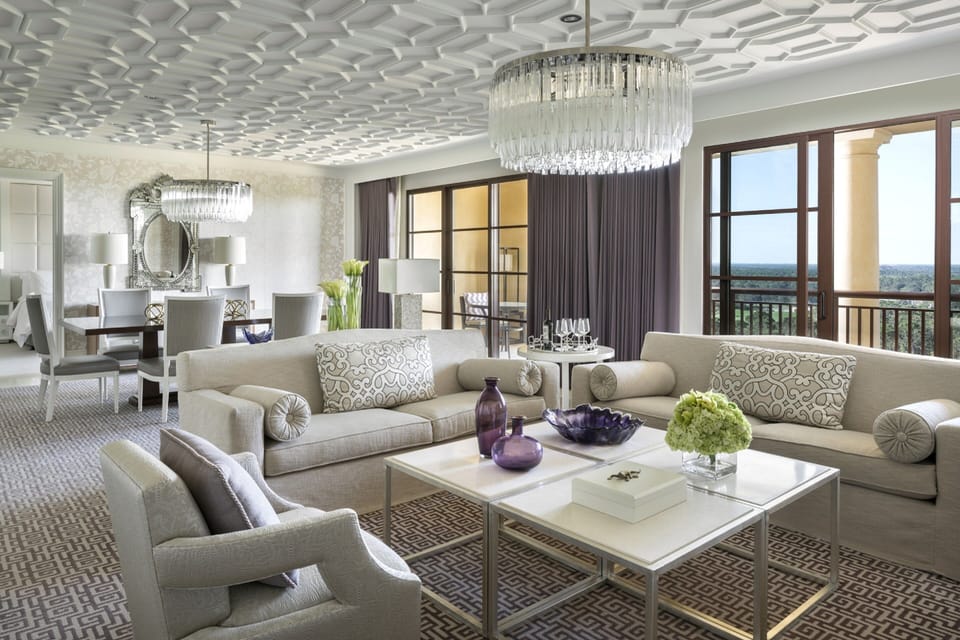 Grand Suite, 1 King Bed | Living area | 55-inch LED TV with cable channels, TV, iPad