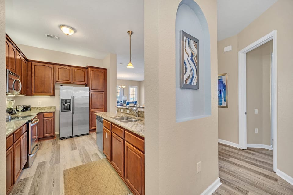 This stylish kitchen captures the essence of modern design, blending functionality and aesthetics seamlessly for a perfect cooking and gathering space.