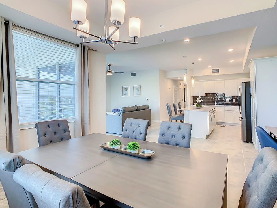 Open-Concept Dining Area Overlooking the Kitchen and Living Room