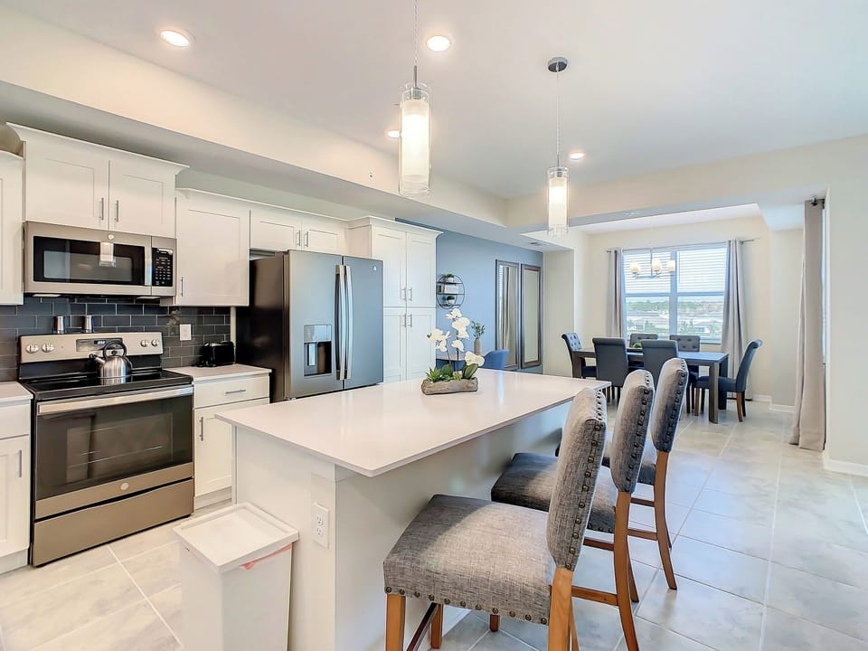Modern Kitchen with Island Seating and Stainless Appliances